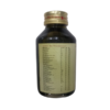 Active Ayurvedic ingredients and classical botanical formula details on the side panel of the SNA Maha Vishagarbha Tailam bottle packaging.